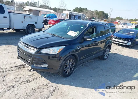 2014 Ford Escape Titanium z USA, uszkodzony, nr VIN 1FMCU9J9XEUD60083
